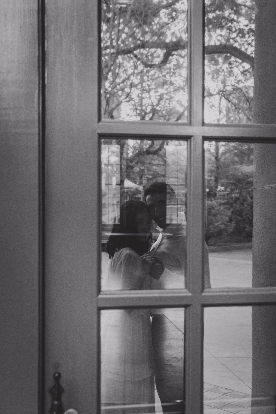 A quiet moment together, seen through the window